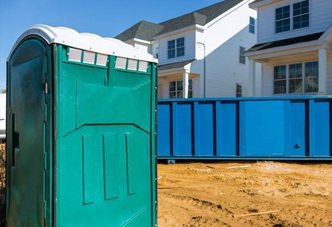 a line of port-a-potties offering a necessary break from work on a work site